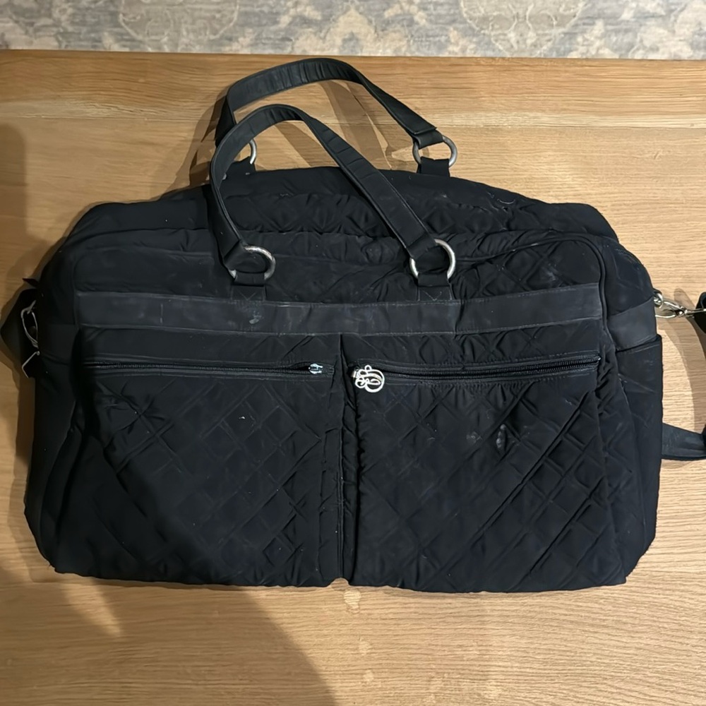 Vera Bradley large duffel with pockets. All working zippers/Straps. Like new.